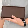 Carteira Transfronteiriça Longa de Couro Genuíno, Multifuncional, Porta-Moedas de Grande Capacidade, Bolsa para Celular, Suporte para Fones de Ouvido e Organizador de Documentos