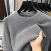 Otoño 2026 Nuevo Suéter de Punto para Hombre Cuello Redondo Manga Larga Color Sólido Moda Casual Camisa Básica Ropa para Hombre Venta al por Mayor