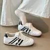 Zapatos de suela gruesa estilo alemán para mujer 2026 Primavera/Verano Nuevos Versátiles Blancos Zapatos Deportivos Casuales Con cordones Suela plana Zapatos de tabla Forrest Gump
