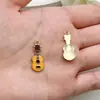 Conjunto Misto de 40 Pingentes de Joias Musicais com Gotejamento de Óleo Apresentando Guitarra, Violino, Piano e Pingentes Dourados para Acessórios de Chaveiro DIY