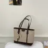 Bolso de mezclilla transfronterizo de gran capacidad para mujer, nuevo modelo de verano 2026, bolso de hombro simple y elegante para el trabajo y los desplazamientos, bolso tote