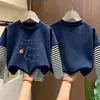 Camiseta de manga larga a rayas de algodón puro para niña, top elegante nuevo para niños 2026, camiseta interior de otoño de dibujos animados para niña pequeña
