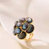 Anillo con apertura ajustable, temperamento francés suave, fresco y artístico, camelia tridimensional, joyería de mano de hada de lujo de alta gama