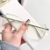 Gafas de metal de color té, ultraligeras, modernas y geniales, para mujer, con montura transparente, alto atractivo estético, montura grande, efecto adelgazante, lentes neutros