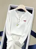 Camiseta de algodón de manga larga con cuello en V abotonado, diseño de copo de nieve para mujer, top blanco moderno y versátil, ropa de mujer Otoño 2026