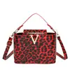 2025 Nueva Moda Estampado de Leopardo Brillante Casual Casual Gran Capacidad Bolso de Hombro Cruzado Bolso de Mano Bolso Cubo para Mujer
