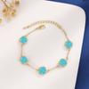 Suministro transfronterizo de nueva pulsera de flores de cinco pétalos con circonitas de colores con microincrustaciones para mujer, moda europea y americana, joyería de tendencia con trébol de cinco hojas