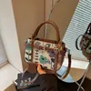 Bolso de hombro retro de moda con cordón para mujer, nuevo bolso cruzado de moda primavera 2026, elegante bolso tipo cubo para mujer