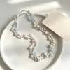 Elegante collar largo de perlas estilo coreano para mujer, versátil para otoño e invierno, exquisita cadena para suéter, colgante de letra simple y único, venta al por mayor