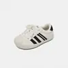 Zapatos de Skate para Niños 2026 Otoño Nuevo Punta de Concha Estilo de Carreras Unisex Velcro Oculto Resistentes a la Suciedad Modernos Geniales Deportivos
