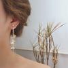 Pendientes largos con borlas de hada súper fría de estilo femenino, diseño de temperamento francés, pendientes de lazo suave, pendientes con personalidad