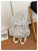 Mochila de lona de nylon con lunares de gran capacidad para mujer, nuevo modelo 2026, linda y moderna, adecuada para el uso diario