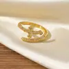 Anel Europeu e Americano de Venda Quente Transfronteiriço com Abertura Circular, Zircônia Microincrustada, Sensação Elegante e de Alto Padrão, Anel Ajustável e Versátil para o Dedo Indicador