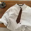 Camisas Infantiles 2026 Ojos Bizcos Nuevas Llegadas de Primavera Niños y Niñas Camisas Personalizadas con Corbata Camisas a Rayas de Cuello Redondo para Bebé