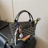Bolsa Pequeña Mujer 2026 Nuevo Estilo Bolso de Mano Estampado de Gama Alta Bolsa Pequeña de Mano Nicho Versátil Hombro Cruzado Bolsa Dumpling