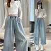 Foto Real de Pantalones Harem de Mezclilla para Mujer Color Sólido 2026 Zanahoria Adelgazantes Ajuste Holgado Otoño Rectos Azul Claro Cropped Estilo Papá