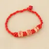 Pulseira de Corda Vermelha Grossa com Três Caracteres Estilo Étnico Corda de Mão
