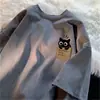 2026 Nuevo Verano Dibujo Animado Gatito Holgada Cuello Redondo Versátil Juvenil Estilo Hong Kong Casual Manga Corta Camiseta para Adolescentes