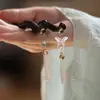 Nuevo Estilo Chino Retro Colgante Largo Rojo Forma de Gota de Agua Diseño de Nicho Mariposa de Alta Calidad Gota de Agua Estilo Nacional Pasador con Borla para Mujeres