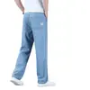 Calça Jeans Tencel Xintang Guangzhou para Homens, Novo Estilo Outono, Calça Reta Solta Azul Claro, Calça Masculina de Seda Gelada, Super Nova