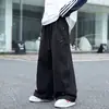Calças Casuais para Meninos 2026 Outono Novo Estilo Crianças de Tamanho Médio e Grande Moda Versátil Calças Longas Wide-Leg Marca da Moda Calças Cargo Largas