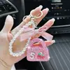 Llavero de Bolsa Transfronterizo con Diamantes Completos Cadena de Perlas Creativa Lazo Brillante Colgante de Diamante Personalizado Exquisito Llavero para Coche