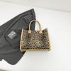Bolso de moda para mujer, otoño e invierno 2024, nuevo bolso de hombro con estampado de leopardo, bolso de mano de gran capacidad para ir al trabajo.