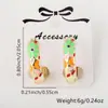 Aretes de anillo de flor gota de aceite mariposa con baño de oro de 18k diseño de nicho aretes transfronterizos europeos y americanos para mujer al por mayor