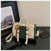 Nueva bolsa de viaje de moda de comercio exterior, gran capacidad, diseño moderno y minimalista, adecuada para viajes cortos, viajes de negocios y uso en el gimnasio, se puede llevar en la mano o usar como bolsa cruzada