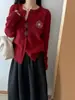 Cárdigan de punto bordado redondo estilo vintage francés, nuevo modelo otoño e invierno 2026, chaqueta suéter versátil de estilo simple para commuting para mujer
