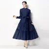 Vestido Nuevo Primavera/Verano 2026 Estilo Europeo y Americano Cuello Alto Manga Larga Cintura Ajustable Bordado Pesado con Perlas, Sensación de Lujo Ligero y Alta Gama