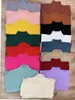 Camiseta de punto para mujer con cuello medio alto, modelo otoño e invierno 2026, color albaricoque, manga larga, top básico ajustado