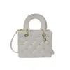 Bolso de mano casual, diseño de nicho, moderno, nueva colección otoño 2026, bolso cuadrado pequeño, bolso de hombro elegante para mujer