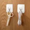 Gancho invisible sin costuras en plata cepillada, gancho adhesivo sin taladro, fuerte fuerza adhesiva, adecuado para usar en paredes y detrás de puertas, gancho adhesivo pequeño