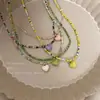 2022 Nuevo Versátil Bosque Color Caramelo Corazón Cuentas de Arroz Collar de Perlas Chica Dulce Elegante Cadena para Clavícula para Mujeres