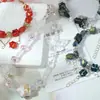 Venta al por mayor de cuentas de cristal con forma de copo de nieve de 10x12 mm con agujeros horizontales para pulseras y collares hechos a mano para DIY
