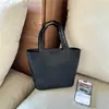 Bolso de Mano de Gran Capacidad para Mujer 2026 Otoño/Invierno Nuevo Versátil Bolso para el Trabajo Bolso de Hombro Bolso Popular de Tendencia Cubo de Este Año