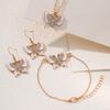 Pendientes de mariposa con taladro de gota de aceite nuevos transfronterizos, collar, traje de moda, joyería simple de tres piezas al por mayor