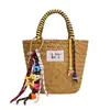 Bolso de Paja Tejida Simple Hecho a Mano Estilo Coreano 2026 Nuevo para Primavera/Verano Bolso de Mano Casual Bolso Tejido de Moda Tendencia