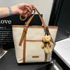 Comércio Exterior Europeu e Americano 2026 Primavera Novo Pingente Leve de Luxo Moda Grande Capacidade Retrô Bolsa de Mão para o Dia a Dia Bolsa Tote de Ombro