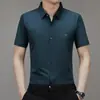 2024 Verano Nuevo Hombres Jóvenes y de Mediana Edad Cuello Solapa Negocios Estampado Sin Costuras Moda Casual Camisa de Manga Corta Cabello de Hombre