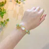 Nueva pulsera de esmalte de mariposa femenina ins nicho lujo ligero Mori azul marino cuentas de colores craqueladas hielo pulsera de amigas al por mayor