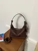 Bolso de mujer transfronterizo con textura tejida, bolso baguette, bandolera casual, nuevo bolso de hombro versátil, bolso de albóndiga texturizado de nicho