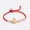 Pulsera de conejo de jade Hetian natural cuerda de mano tejida de ágata blanca diseño de nicho estilo chino cuerda roja para año de nacimiento