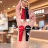 Bestseller transfronterizo creativo llavero colgante de arcilla con pedrería de micrófono lindo micrófono 3D tachonado de pedrería accesorio para bolso