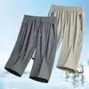 Directo del FabricanteMás Vendidos Shorts Unisex de Seda Helada Genuina Talla Grande, Pantalones Cortos Deportivos Finos de Secado Rápido Rectos para Hombre de Longitud 7/8