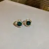 Pendientes vintage de diamante esmeralda Aguja de Plata moda nicho pendientes de lujo ligero alta calidad elegantes personalizados pendientes al por mayor