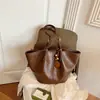 Bolso tote retro versátil transfronterizo de moda europeo y americano para mujer, bolso de hombro para el trabajo, versión coreana de gran capacidad, bolso de mano