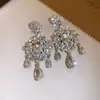 Pendientes de plata estilo europeo y americano con diamantes, colgantes de flor cuadrada y borla de lágrima, pendientes de diseño moderno, accesorios versátiles para mujer