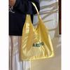 Bolsa de Lona con Estampado de Letras Nicho Corea del Sur para Mujer 2025 Nueva Gran Capacidad Estilo Perezoso Bolso de Hombro Tote para Viajes Cotidianos